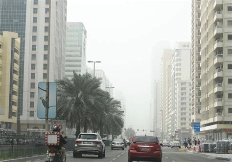 uae weather abu dhabi  dubai covered  sandstorms