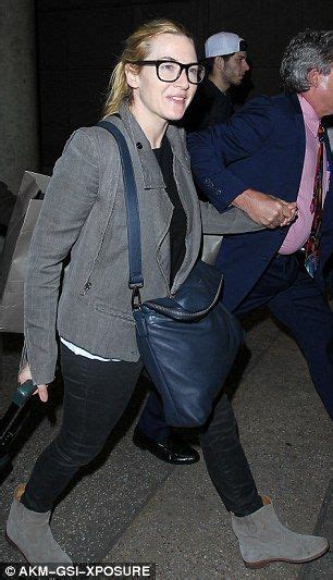 kate winslet shows her specs appeal as she leads stars arriving in la
