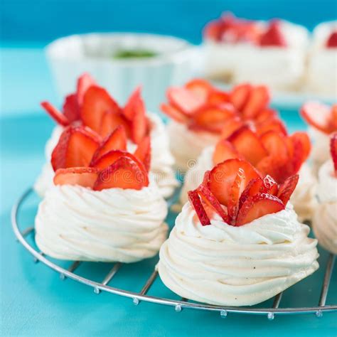 pavlova meringue cake with cream and berries isolated on white background stock image image of