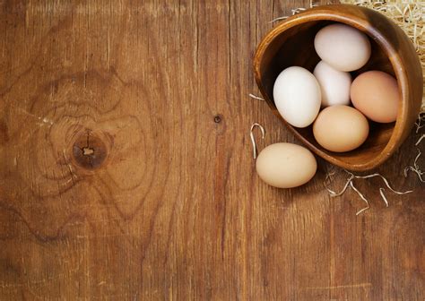 farm natural organic eggs   wooden background whats  wheat