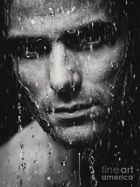 dramatic portrait of man wet face black and white photograph by oleksiy