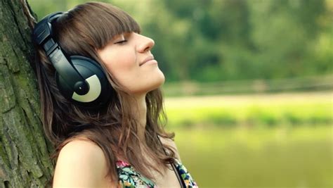 Woman With Headphones Listen To Stock Footage Video 100