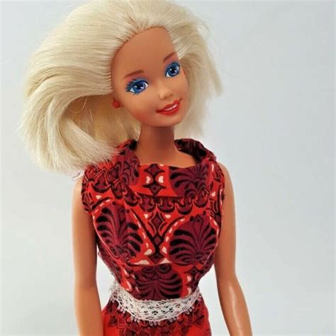 mattel barbie doll blonde hair blue eyes red earrings 90s red black