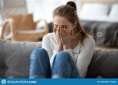 upset girl sit on sofa crying after breakup stock image image of