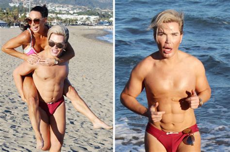 Human Ken Doll Shows Off Fake ‘six Pack’ During Beach