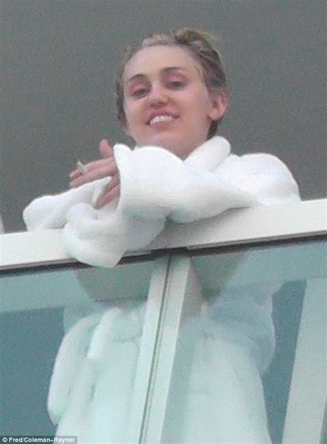 miley cyrus puffs on joint at 7 30am on miami hotel balcony daily