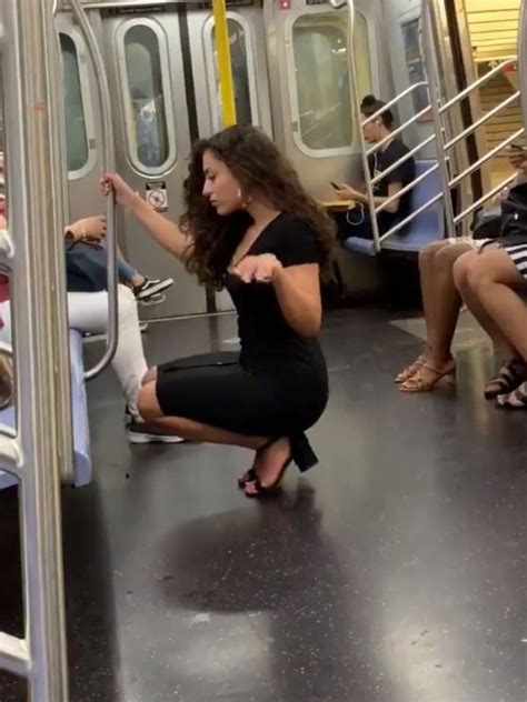new york subway woman s sexy train photo shoot goes viral video