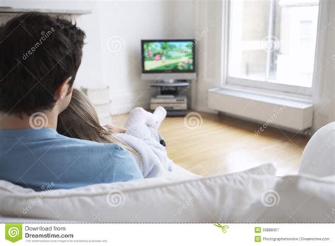 father and daughter watching cartoons in tv stock illustration illustration of domestic