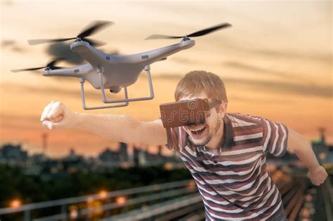 man   virtual reality glasses  controlling  flying drone stock image image