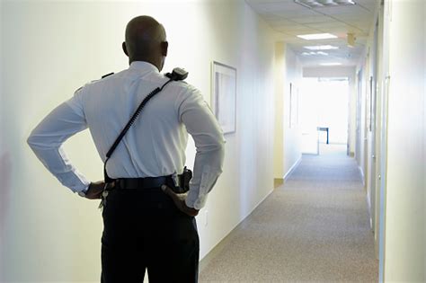 security guard   office corridor stock photo  image  istock
