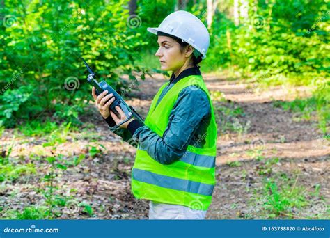 woman worker holding drone quadcopter stock photo image  land female