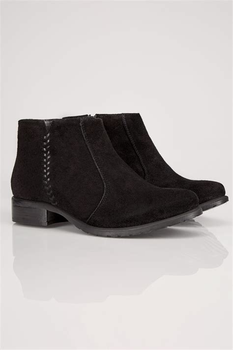 black leather ankle boot with whipstitch side detail in