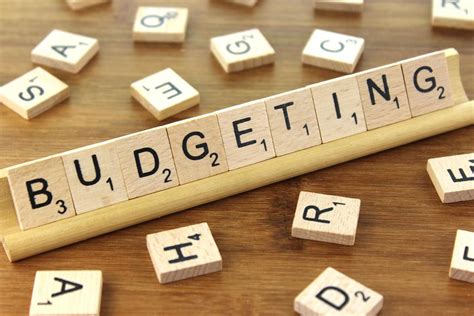 budgeting   charge creative commons wooden tile image