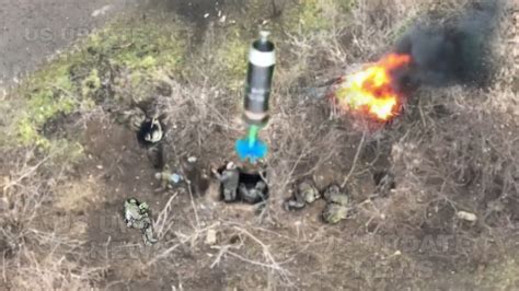 ukrainian drone drops grenade  russian soldiers trenches  positions  bakhmut youtube