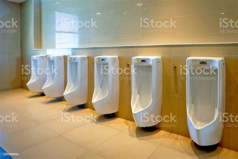 Row Of Outdoor Urinals Men Public Toiletcloseup White Urinals In Mens
