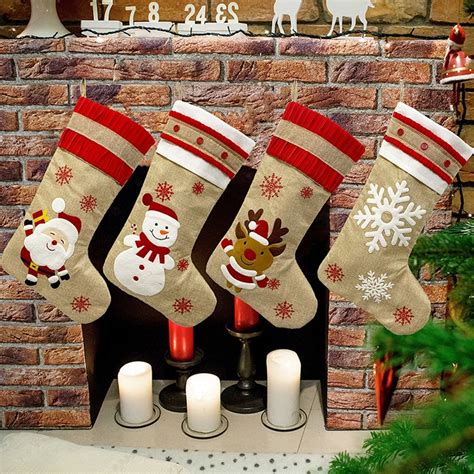 christmas stockings traditional santa snowman reindeer snowflake