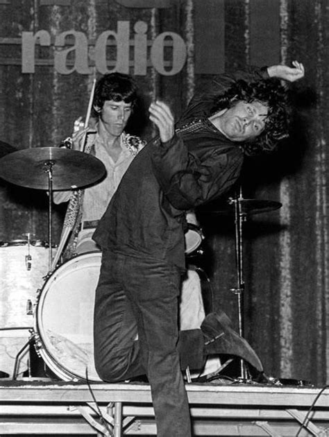 she dances in a ring of fire jim morrison the doors