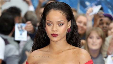 Photos Rihanna Wears Revealing Outfit To Barbados Festival