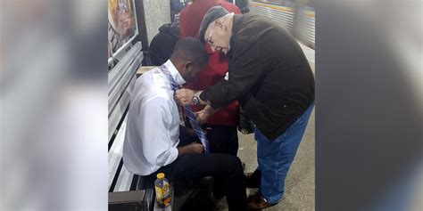 cool old man teaches teen how to tie a tie in subway station askmen