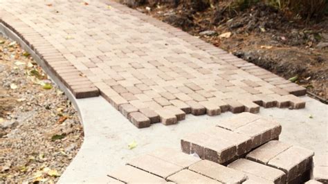 pavers  installed  concrete js brick pavers