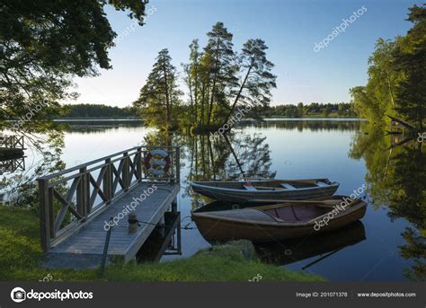boats lake sweden beautiful nature landscape photo warm