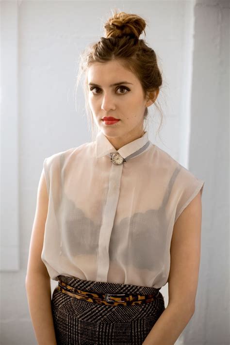 laura ellner s sheer sleeveless blouse is absolutely adorable with the old school watch neck