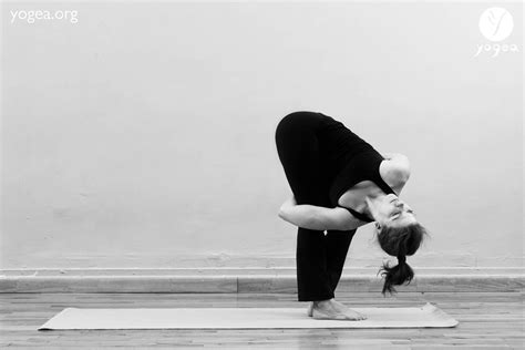 badha parvritta utanasana bound standing twist yogea yoga