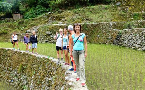 Walking At The Ancient Old Rice Terraces Of Banaue The
