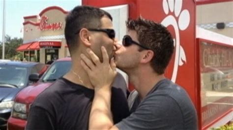 chick fil a opponents stage same sex kiss in abc news