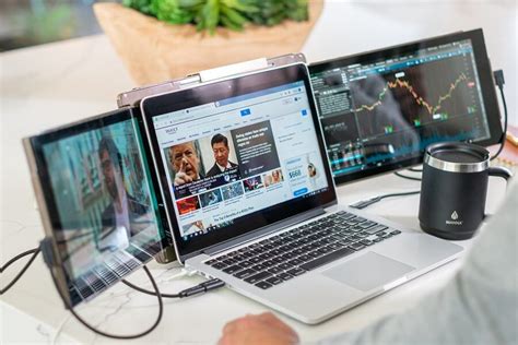 trio portable triple screen monitor shoots   productivity