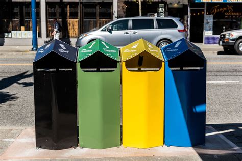 vancouver installing  large garbage  recycling bins  sidewalks