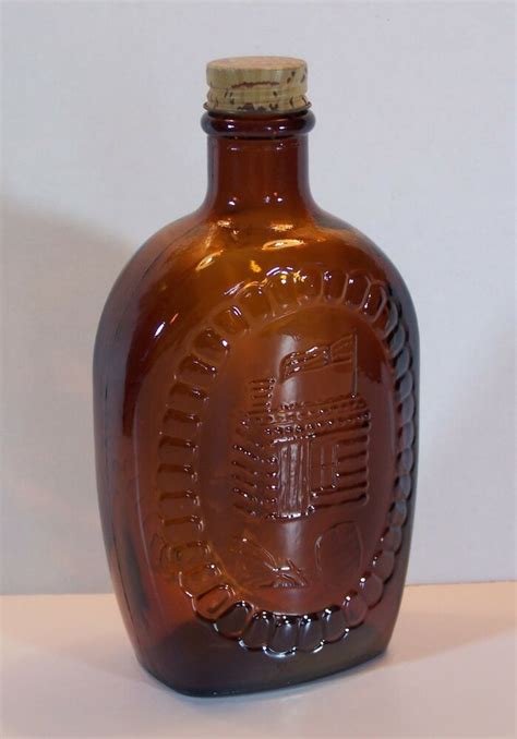 vintage log cabin syrup flask bicentennial amber glass bottle  oz   logcabinsyrup