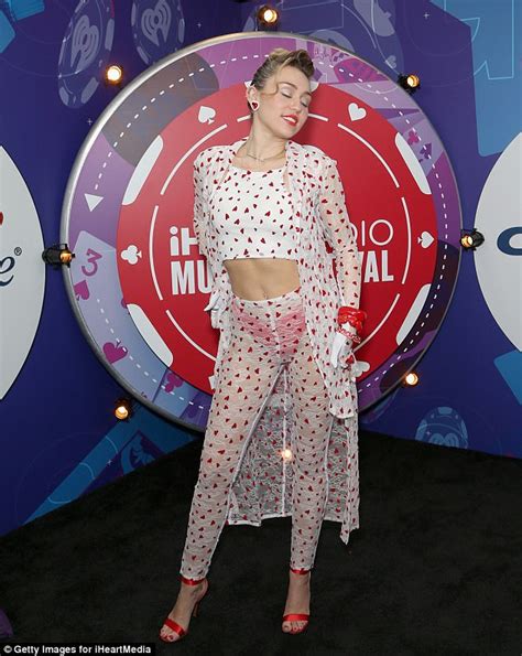 miley cyrus steps out in hearts at iheartradio festival