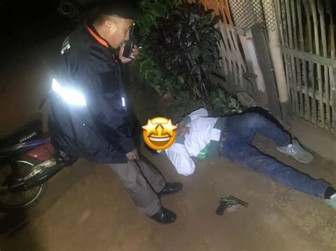 passed out drunk man with gun arrested in chai prakan