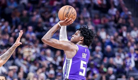balanced attack leads kings  victory  nuggets nbacom