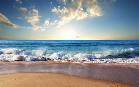 beach sand blue sea waves clouds sun 2560x1600