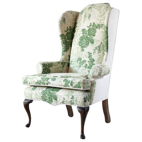 vintage wing chair upholstered  green floral fabric  stdibs