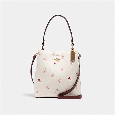 coach outlet small town bucket bag  heart floral print