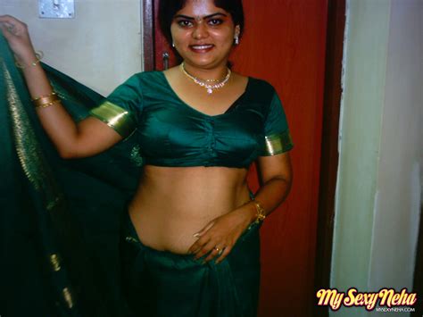 busty indian babe neha stripping her saree and shows her ass and boobs asian porn movies