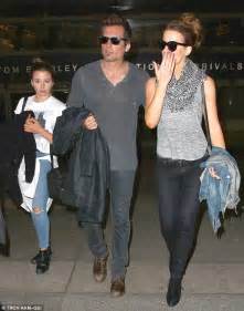 kate beckinsale makes a stylish arrival at lax with mini