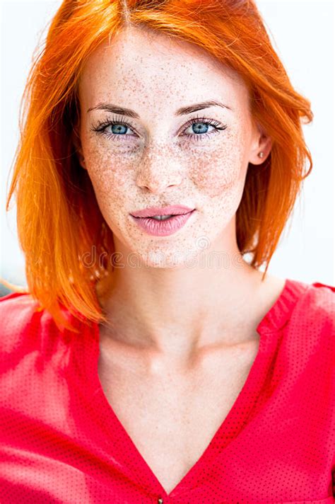 beautiful redhead freckled woman smiling seductive biting lips stock image image of caucasian