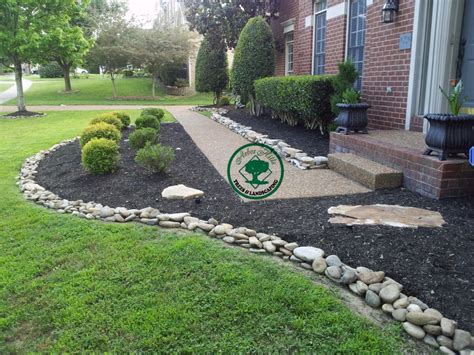 river rock  mulch arbor hills trees landscaping