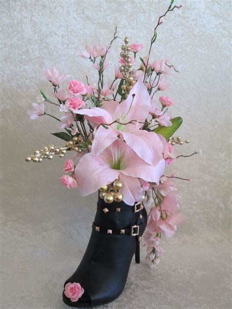 silk flower arrangement   black  gold studded high heel ankle