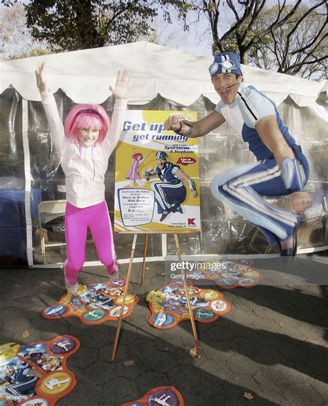 Nickelodeons Sportacus And Stephanie Pose At Lazy Town Race In