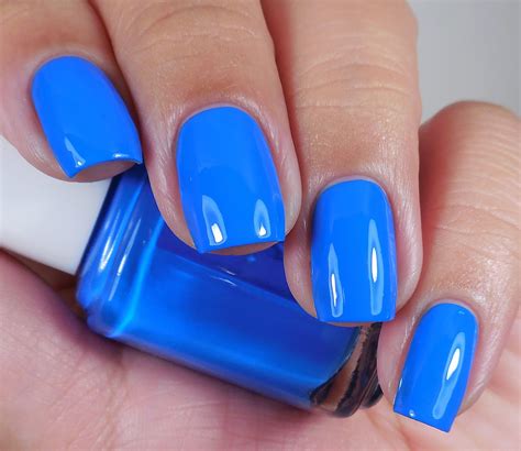 essie   noise  bright blue creme nail polish   essie summer neon