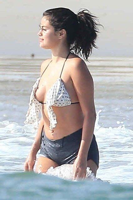 selena gomez continues to flaunt her bikini bod in the face of body shamers entertainment tonight