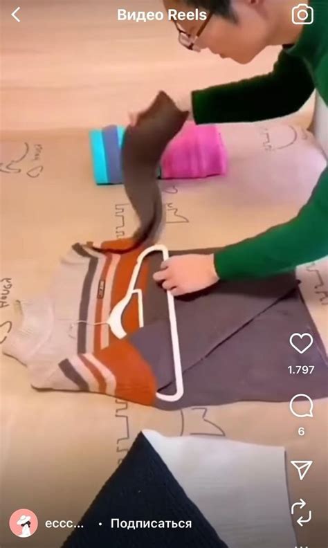 a woman is making shoes out of paper