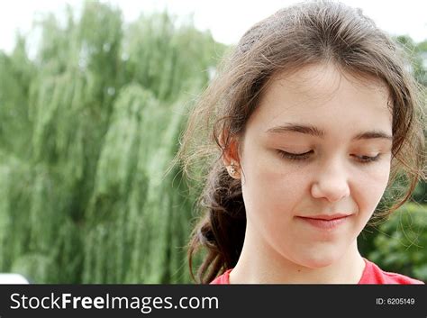 smiling teen girl looking down free stock images and photos 6205149