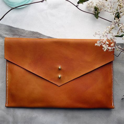 handmade leather envelope clutch bag  tori lo leather notonthehighstreetcom