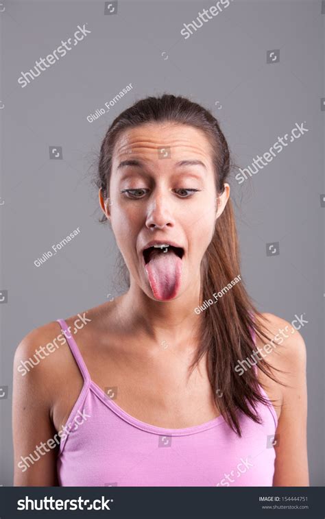 funny pretty girl tongue stuck out 스톡 사진 154444751 shutterstock